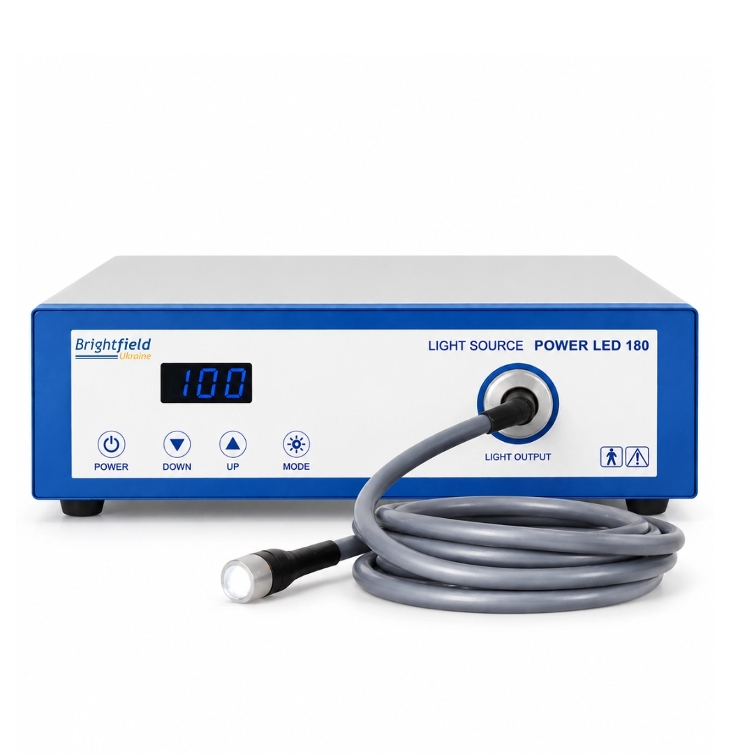 Brightfield POWER LED 180 endoscopic LED light source, front view with digital display, control buttons and connected fiber optic light guide