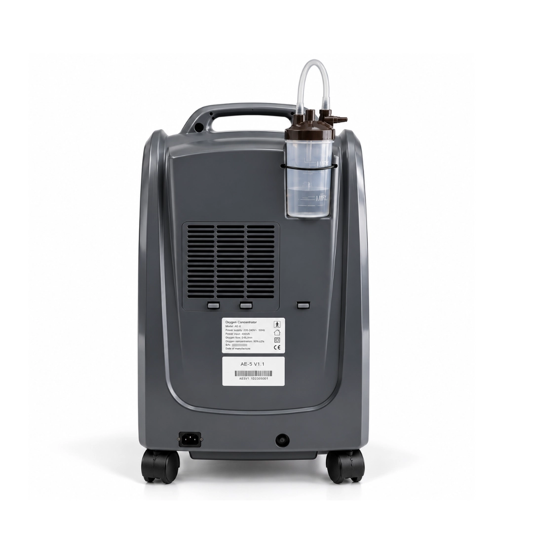 Rear view of AERTI AE oxygen concentrator with ventilation grille, humidifier bottle and technical labels